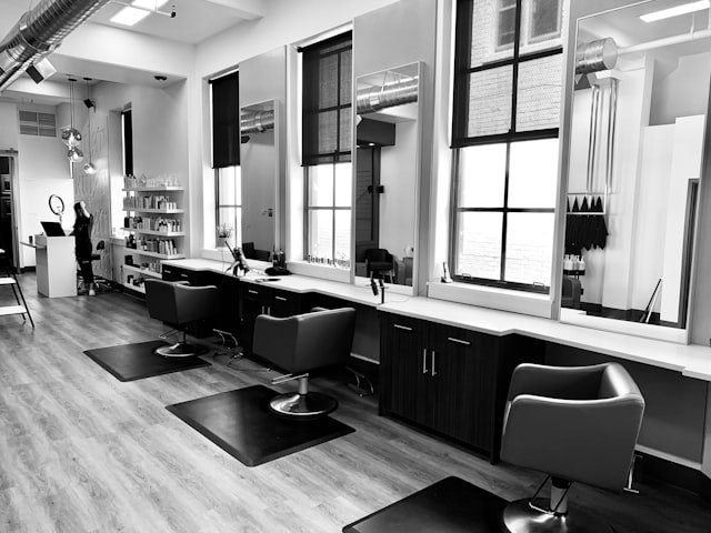 Hair stylist working on a client